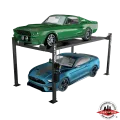 Green classic muscle car on top and a modern blue sports car below on a Direct Lift four post car lift, highlighting the lift's versatility for both vintage and contemporary vehicles.