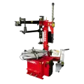 Rotary R146RP motorcycle tire changer with assist arm and wheel clamped for service