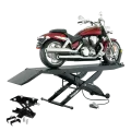 Maroon cruiser motorcycle on Forward Lift 1000MCLDT motorcycle lift table with ramp and optional accessories shown