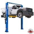 White Ford service utility truck elevated on a Forward Lift I12 two post lift, ideal for heavy-duty vehicle maintenance, ALI certified