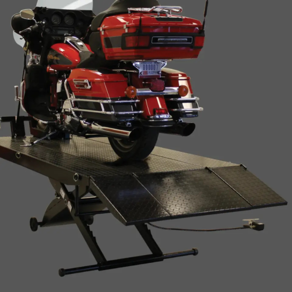 Rear view of a motorcycle positioned on the Forward Lift 1000MCL portable motorcycle and ATV lift, highlighting the extended ramp and sturdy lift platform.