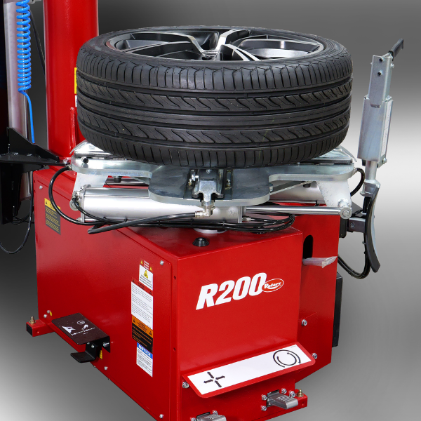 Rotary® R200 | High Volume Swing Arm Pro Tire Changer Rotary R200 professional tire changer tabletop with tire mounted for high volume shops