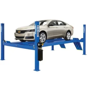 Forward Lift CR14 four post service lift holding a champagne Chevy Impala