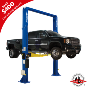 Forward Lift DP18 two-post vehicle lift raising a heavy-duty black pickup truck, showcasing its ALI Gold Certified performance and high lifting capacity.