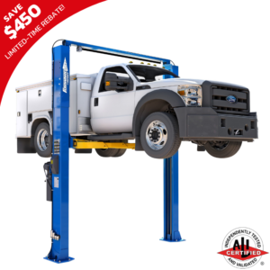 Image of a blue two-post car lift hoisting a white utility truck, showcasing the heavy-duty lifting capability and durable construction of the lift system.