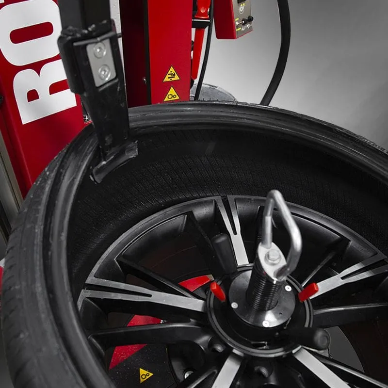 Rotary® | R1250 Leverless Pro | Premium Automatic Tire Changer PATENTED, WORRY-FREE TIRE DEMOUNTING The polymer tool head slides between the bead and rim, eliminating metal-on-metal contact and preventing damage to the tire or rim.