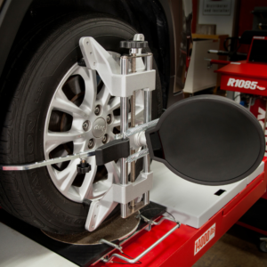 Close-up of the Rotary R1085 Pro 3D Wheel Aligner sensor target attached to a vehicle wheel, designed for precise alignment readings.