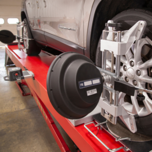 Close-up of the Rotary R1085 Pro 3D Wheel Aligner sensor target attached to a vehicle wheel, designed for precise alignment readings.