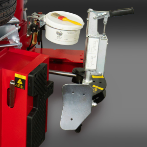 Rotary® R144i | High Performance Swing Arm Tire Changer Close-up of the R144i Tire Changer’s hand-controlled bead breaker system, designed for precise operation, reduced rim damage, and lower operator strain.
