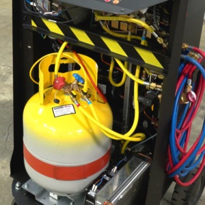 Internal view of the Rotary R3AC50 Automatic A/C Cart, featuring the refrigerant tank, color-coded hoses, and safety components.