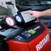 Close-up of the Rotary R3AC80 A/C cart touchscreen showing vehicle selection interface for AC servicing.