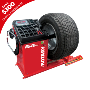 Rotary R540 RTLD Truck 2D Wheel Balancer with a large commercial truck tire mounted, featuring a digital control panel and integrated tool tray. Includes a limited-time $300 rebate promotion banner.