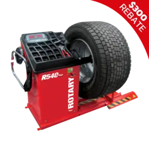 Rotary R540 RTLD Truck 2D Wheel Balancer with a large commercial truck tire mounted, featuring a digital control panel and integrated tool tray.