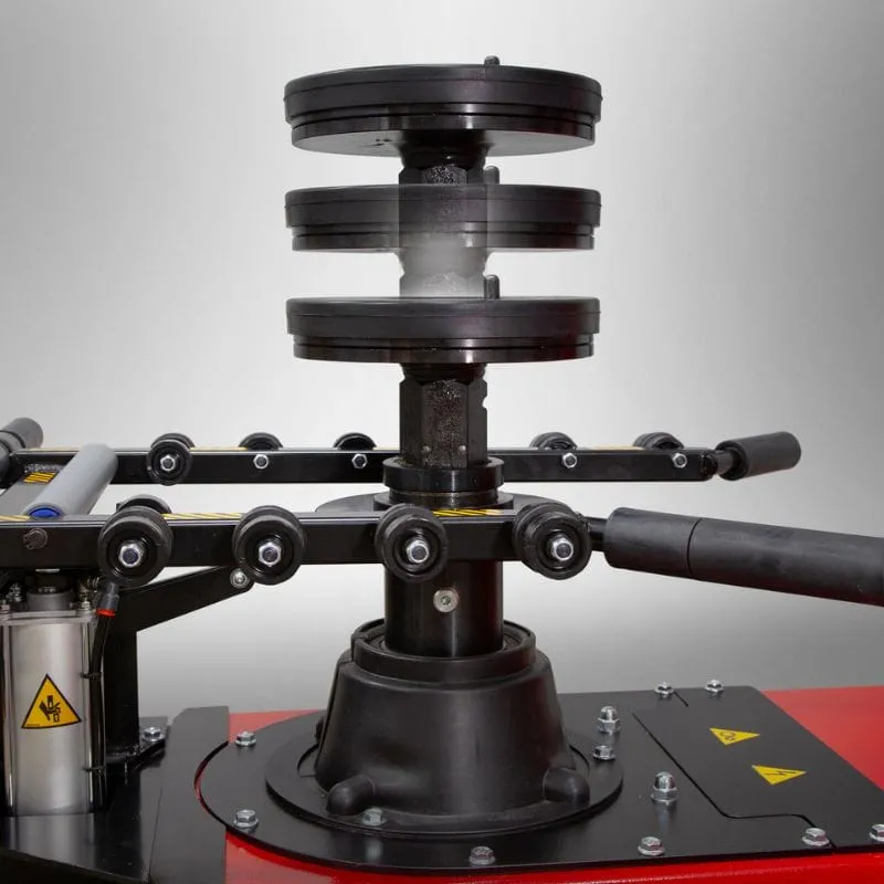 Rotary® | R1250 Leverless Pro | Premium Automatic Tire Changer THREE-POSITION CENTER LOCKING POST Accommodates both standard and reverse-mount rims for versatile tire servicing.